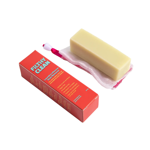 Stain remover soap bar with a grip net for no slip scrubbing